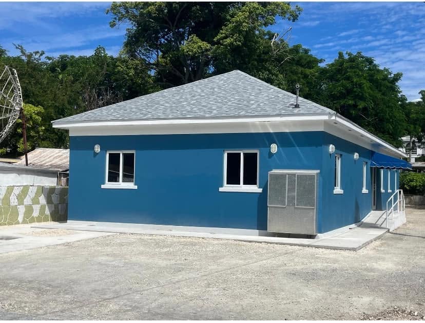Blue exterior of the Education and Empowerment Centre