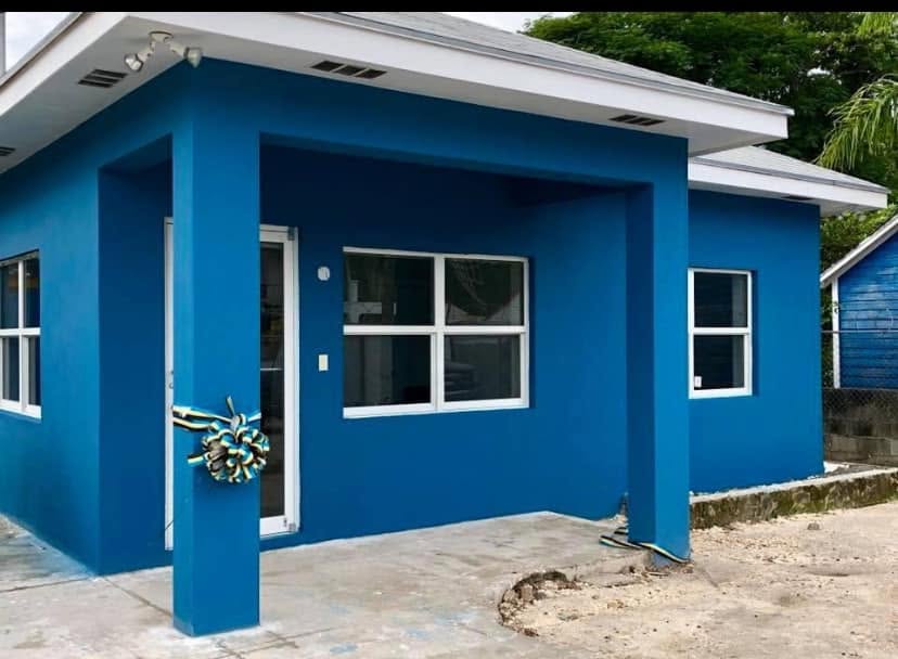 Blue exterior of the Neville and Nora Dorsett Community Centre